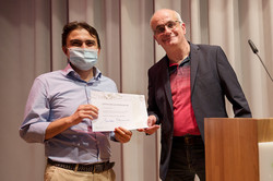 Presentation of certificate to Alejandro Garcés Ruiz